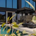 Sunbeds, pool and suite entrance