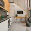 Kitchen and staircase leading to loft