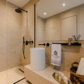 Loft bedroom en-suite bathroom with shower