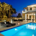 Villa and pool area by night