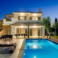 Villa and pool area by night