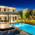 Villa and pool area by night