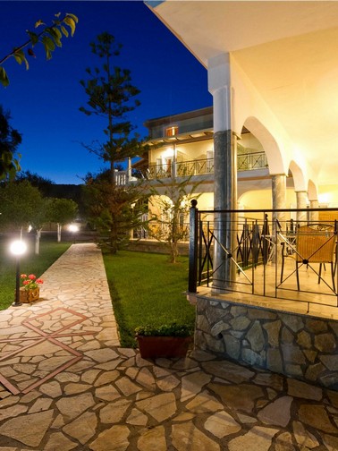 Marble-paved outdoor path by night