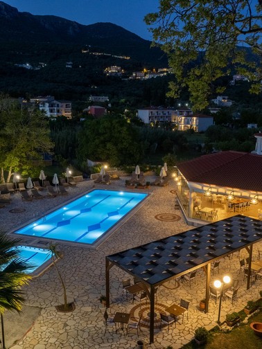 Aerial view of pool area by night