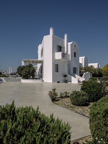 Parking area and villa in the background