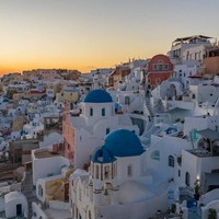 The Blue Domes Cave Villa (7 persons) and Oia at sunset