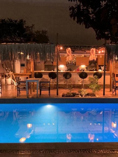 Pool and pool bar by night