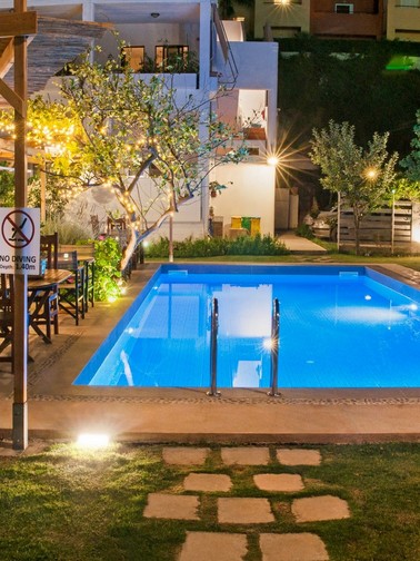 Pool bar and pool by night