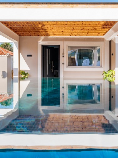 Pool and villa entrance (and even closer)