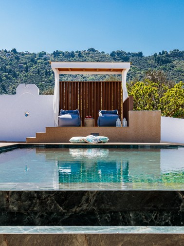 Pool, sunbeds and pouf sunbeds