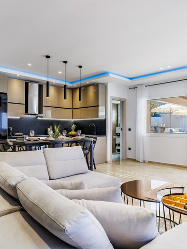 Indoor sitting area and open-plan kitchen