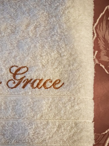Towel with Villa Grace logo