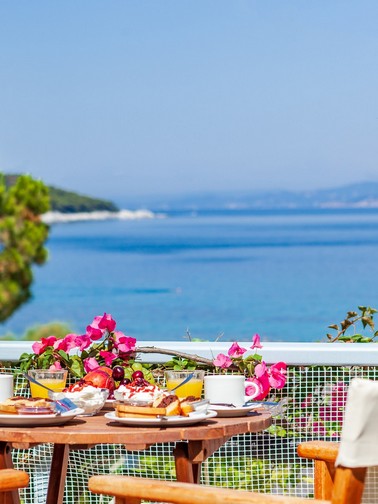 Outdoor breakfast enjoying a lovely sea view