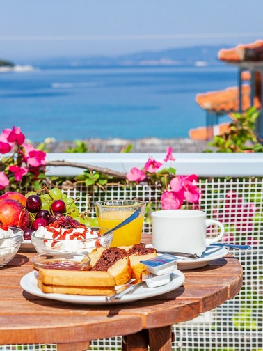 Outdoor breakfast enjoying a lovely sea view